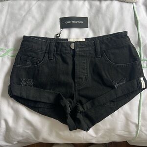 Black denim Jean shorts. Brand new never worn.  Too big for my daughter.